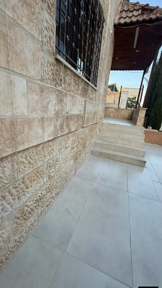 شقة طابق أرضي بحديقة ومدخل مستقل في نزال - 5