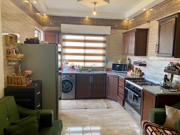 شقة فاخرة للبيع في ضاحية الأمير حسن مؤجرة بعائد ممتاز