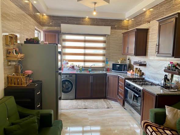 شقة فاخرة للبيع في ضاحية الأمير حسن مؤجرة بعائد ممتاز